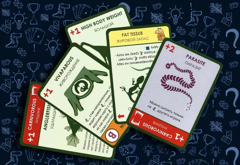 Игровая карта свойства лицевой стороной, добавляющая уникальные способности животному Эволюция